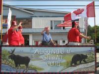 Ill Sir Jim RENNIE, Potentate, riding on the float with our Nobles at the Kinmount Parade.